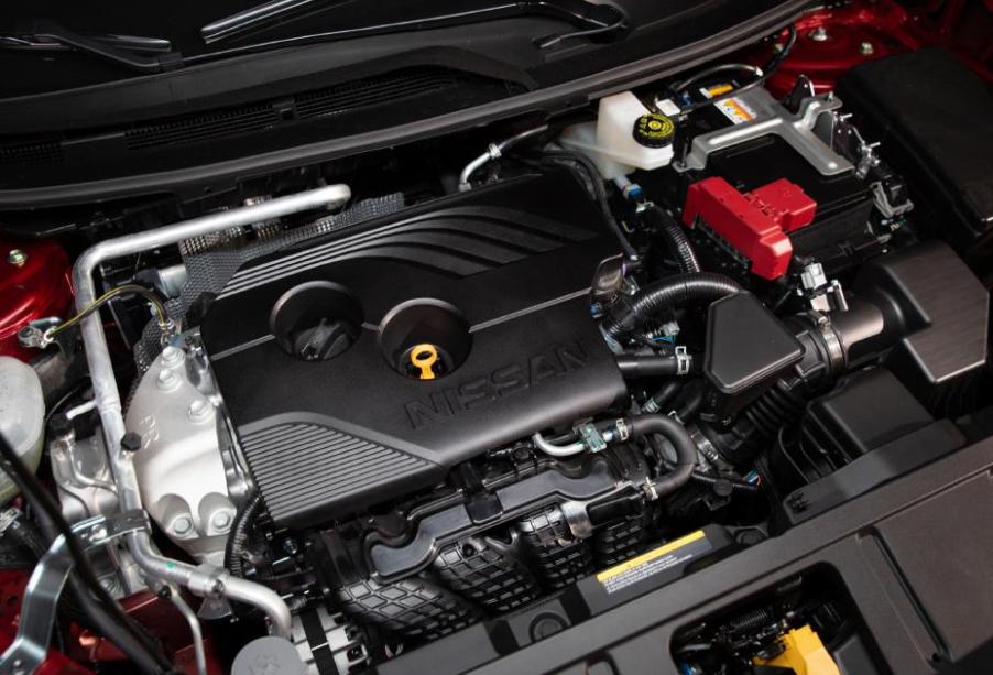 View under the hood of a red 2021 Nissan Rogue