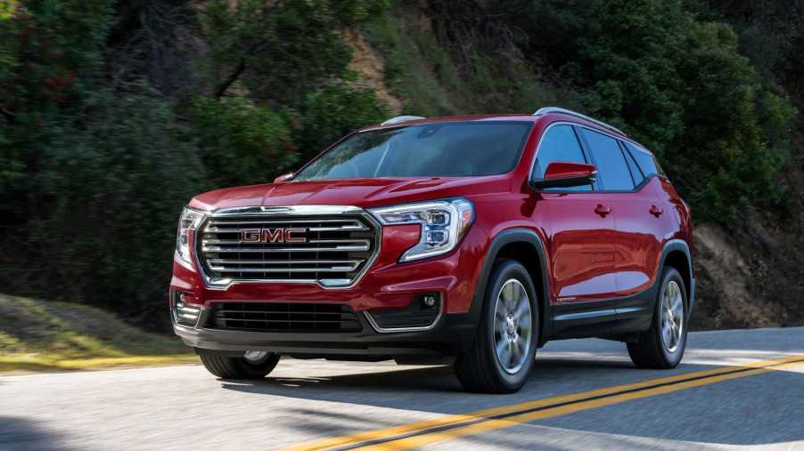 The 2022 GMC Terrain driving down the street