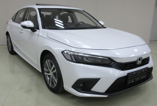 An image of a white 2022 Honda Civic ahead of its global debut.