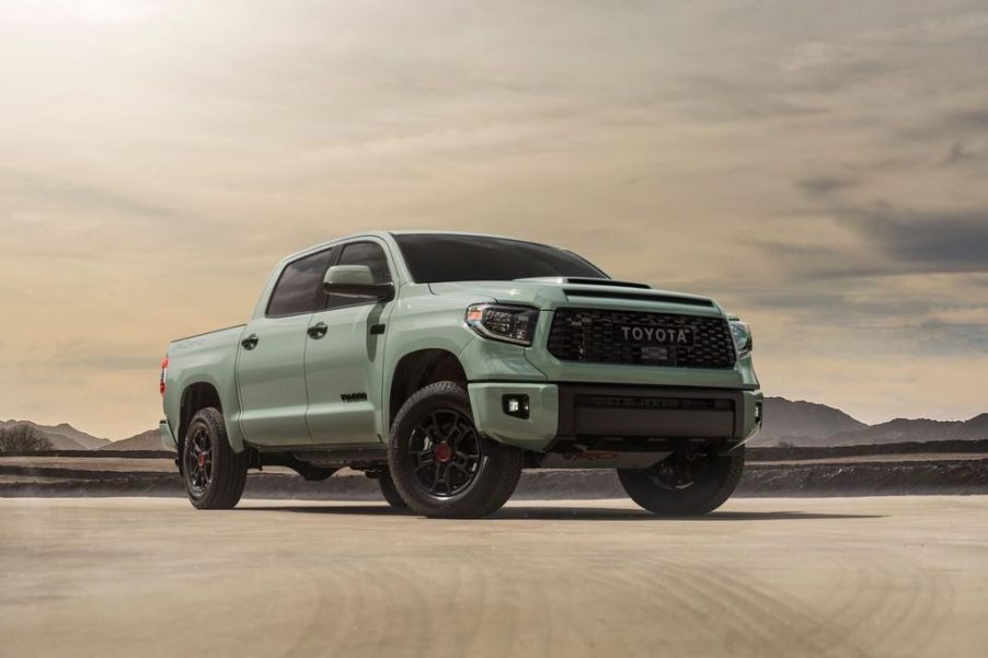 a 2021 toyota tundra trd pro in Lunar Rock shoing up its aggressive stance in the desert