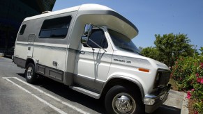 An RV in a parking lot waiting for a new adventure