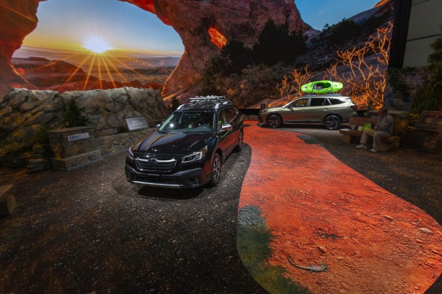 Two Subaru Outback on display at an auto show