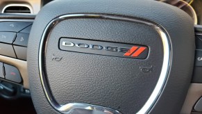 The Dodge logo seen on a steering wheel