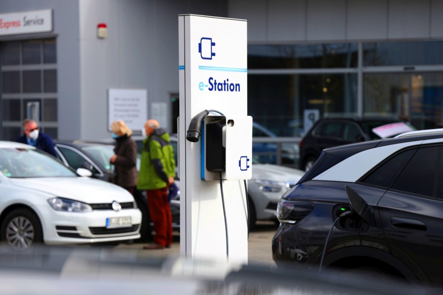 Public electric vehicle charging stations sometimes charge a fee