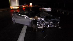 An image of a crashed Ferrari F8 Tributo out on a street.