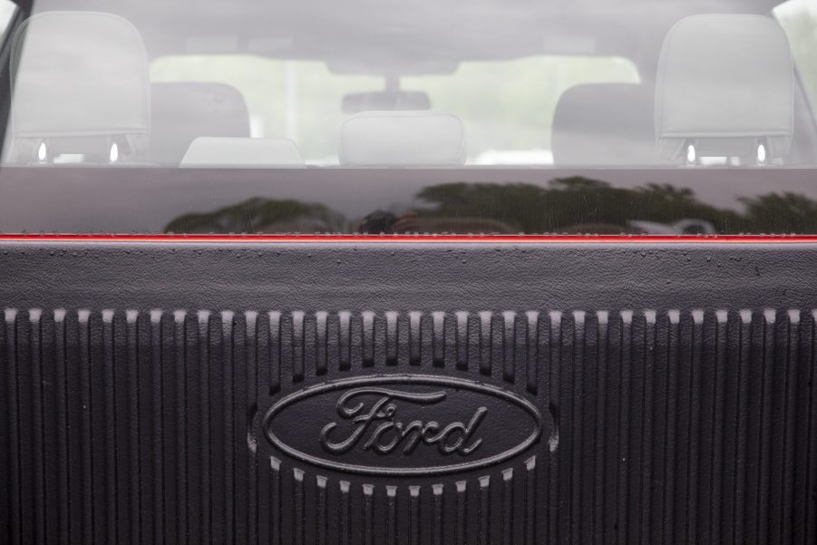 The rear window of a Ford F-150 seen from the bed of the truck