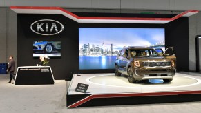 A Kia Telluride on display on a stage