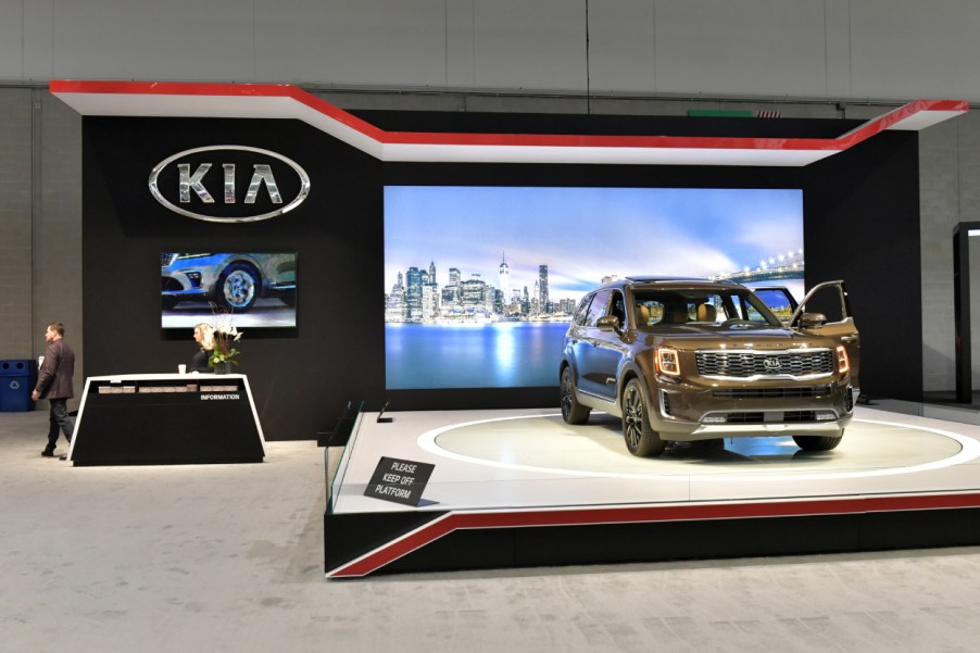 A Kia Telluride on display on a stage