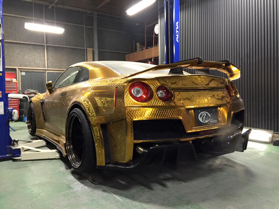 Kuhl Racing gold chrome engraved Nissan GT-R rear 3/4 view