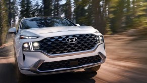 An action shot of the front of a 2021 Hyundai Santa Fe | Hyundai