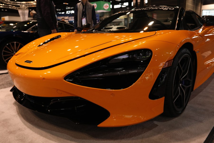 A McLaren 720S Spider on display at an auto show