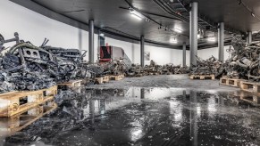 Part of the remnants from the Top Point Motorcycle Museum's burned collection on pallets