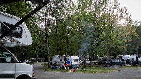 RV campers make a fire at a KOA campground in Fredericksburg, Virginia, on Saturday, September 19, 2020