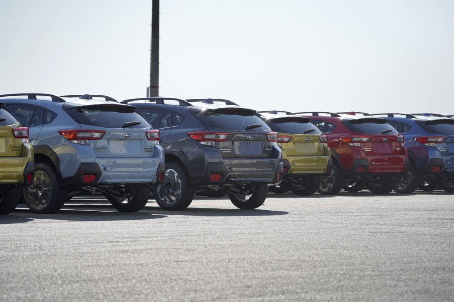 A row of Subaru Crosstrek lined up and ready to be shipped