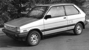 A black and white image of a late 1980s Subaru Justy hatchback