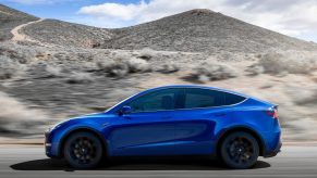 An image of a Tesla Model Y out on a race track.