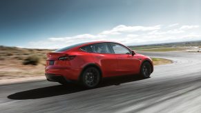 An image of a Tesla Model Y out on a race track.