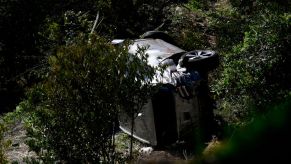 Tiger Woods accident vehicle resting on its side