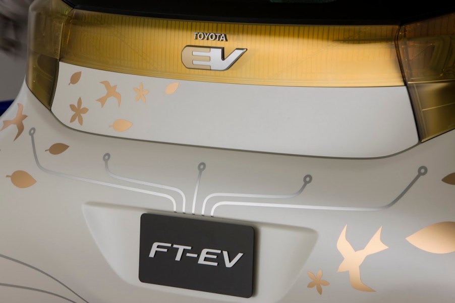 Gold and white Toyota EV back hatch