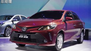 A red Toyota Vios on display