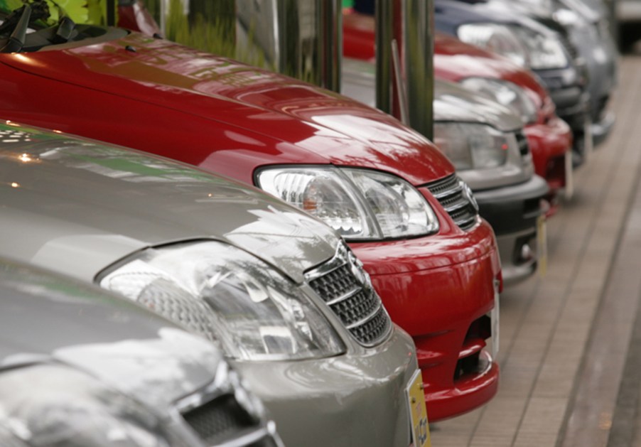 Rows of Toyota Corolla vehicles await buyers at the Toyota Corolla showroom in Tokyo, Japan, on Monday, March 5, 2007