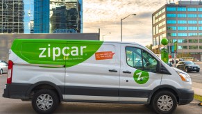 Zipcar rental cars include this white-and-green van parked in a Yonge Street parking lot in Toronto, Ontario, Canada