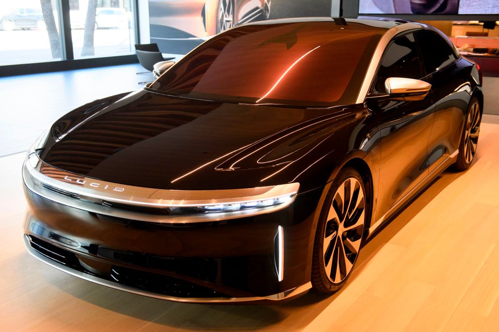 A black Lucid Air Grand Touring luxury electric sedan on display