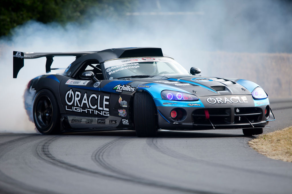 A track edition dodge viper takes a hard corner at the track