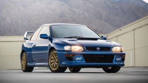 An image of a blue Subaru Impreza 22B STi parked outdoors.