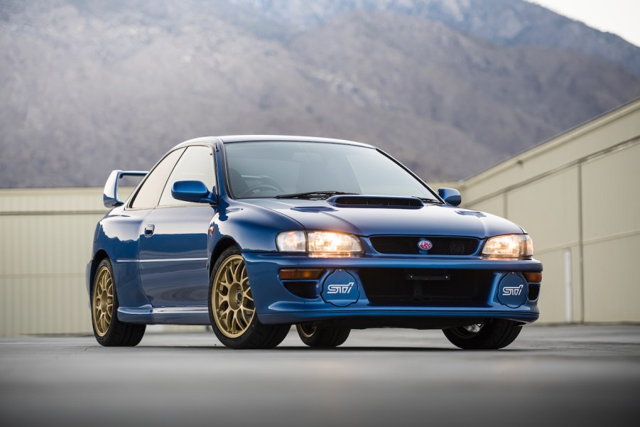 An image of a blue Subaru Impreza 22B STi parked outdoors.