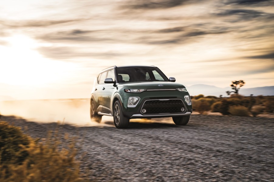 The recently recalled 2021 Kia Soul driving on a gravel road