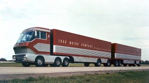 The red-and-silver 1964 Ford 'Big Red' gas turbine truck driving down a highway