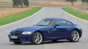 A blue 2006 BMW Z4 M Coupe on a racetrack