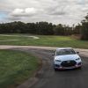 Performance Blue 2019 Hyundai Veloster N being tested on Car and Driver track