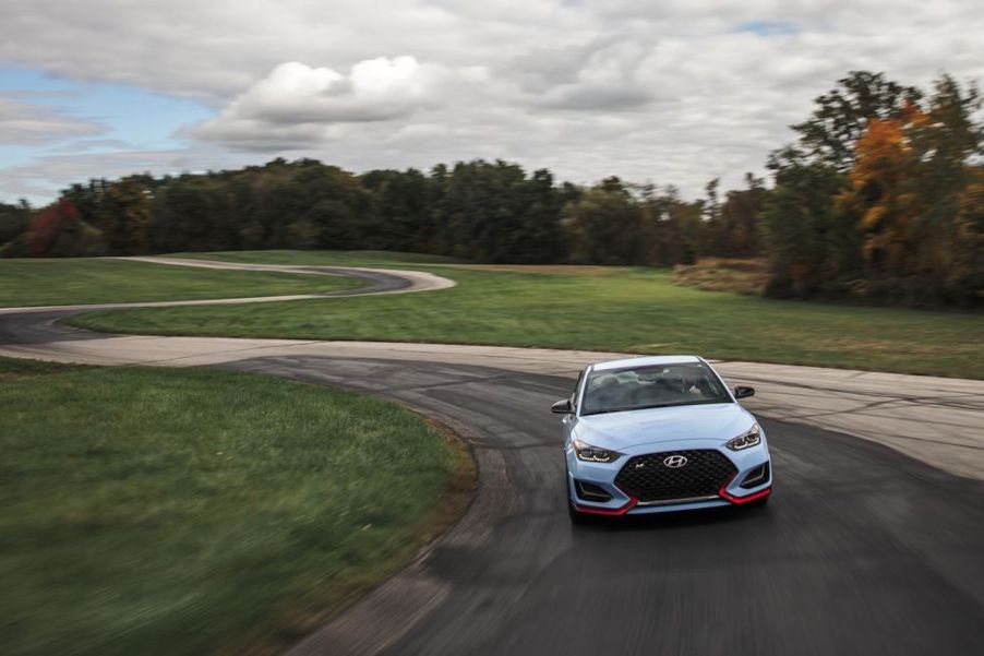 Performance Blue 2019 Hyundai Veloster N being tested on Car and Driver track