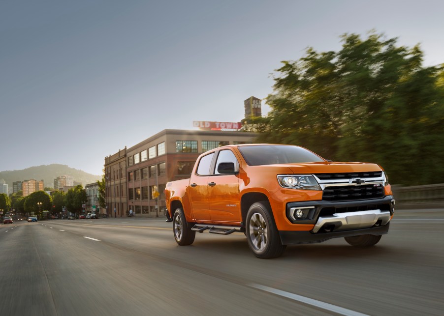 An orange 2021 Chevrolet Colorado Z71 driving