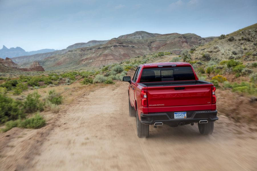 2021 Chevrolet Silverado LT Trail Boss driving down a dirt road