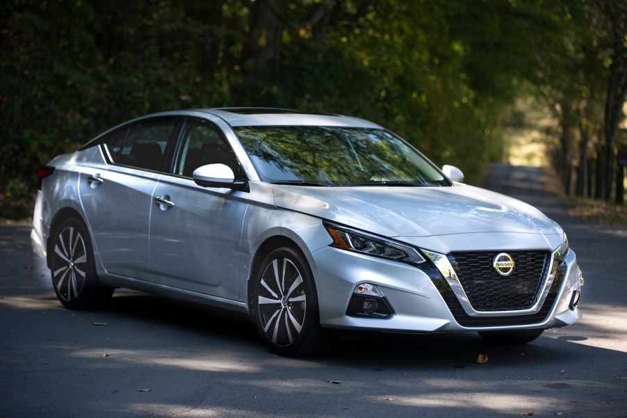 A silver 2021 Nissan Altima parked in the shade