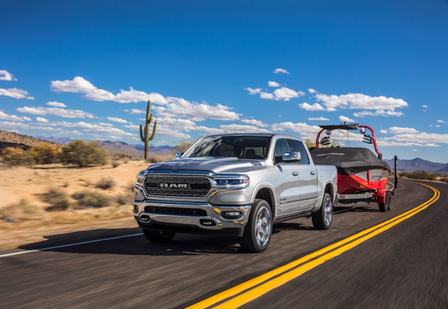 A 2021 Ram 1500 pickup truck seen towing a boat