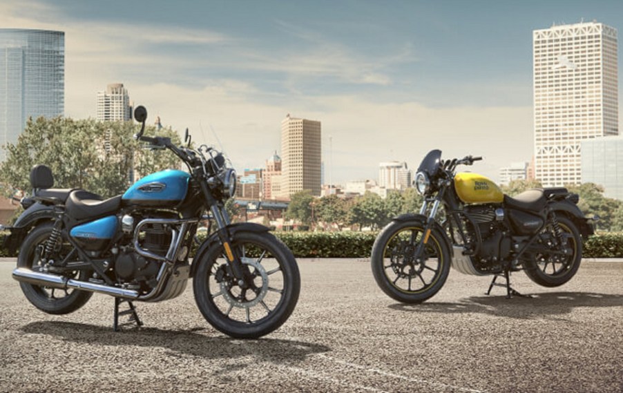 A light-blue 2021 Royal Enfield Meteor 350 Stellar next to a yellow 2021 Royal Enfield Meteor 350 Fireball