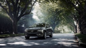 A 2021 Volvo XC60 Inscription luxury compact crossover SUV with Pine Grey metallic exterior paint