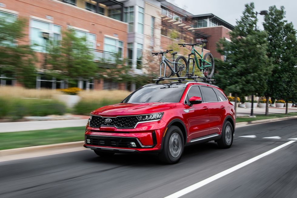 The 2021 Kia Sorento Hybrid driving in the city