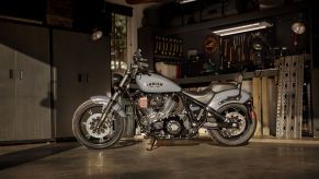 A gray 2022 Indian Chief Dark Horse with Rogue Collection accessories in a garage