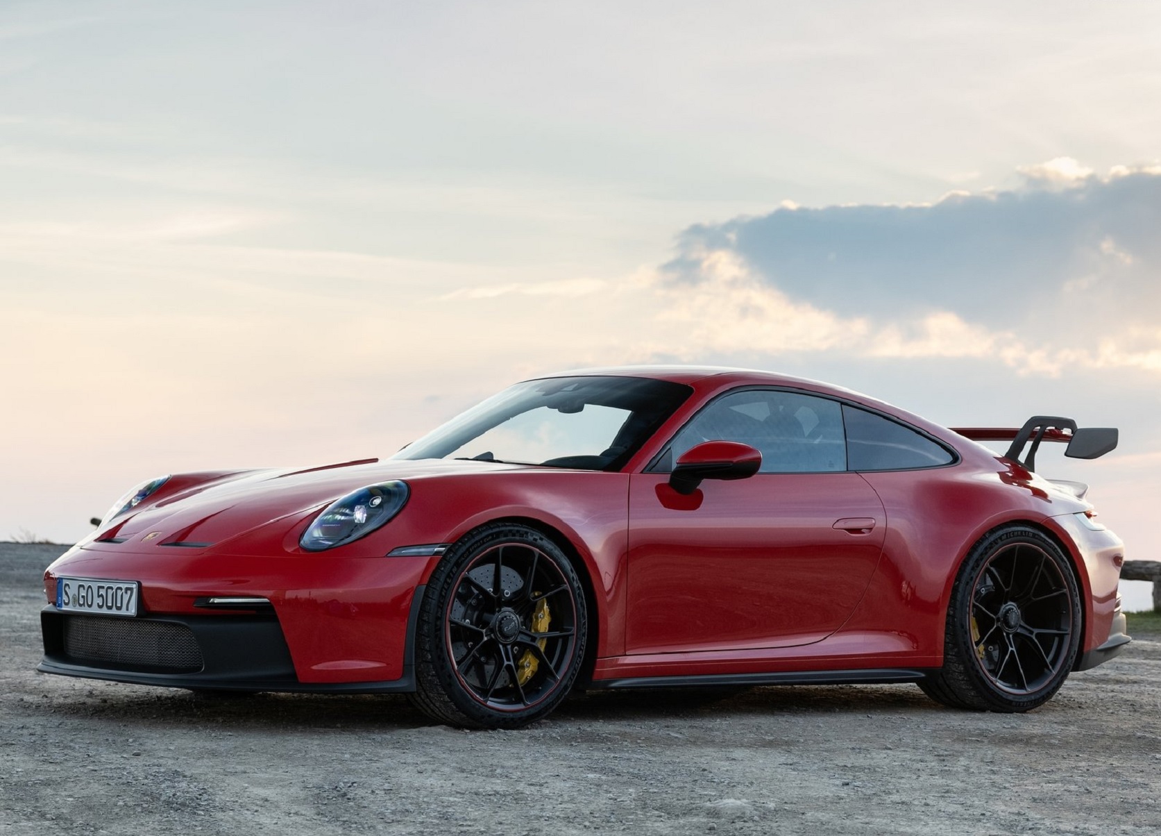 a red 2022 Porsche 911 GT3 parked during a drive