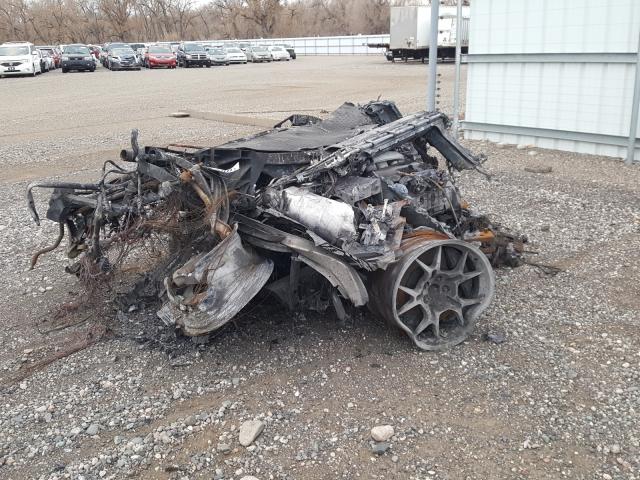 An image of a destroyed Ford GT at a Copart auction.