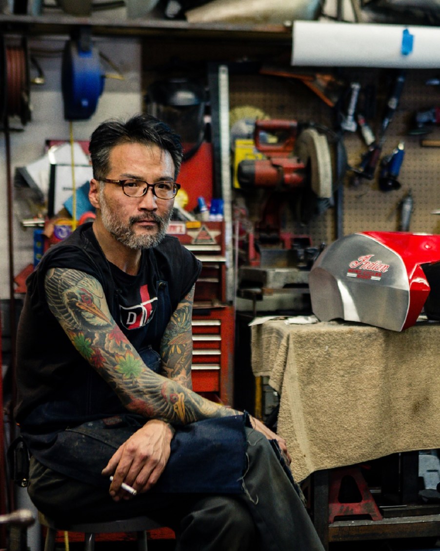 Bike builder Keino Sasaki in his garage