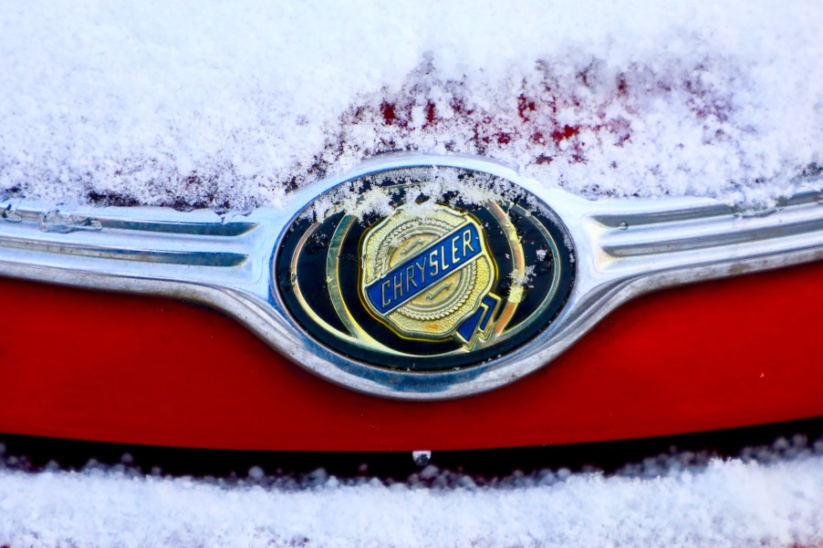 A Chrysler emblem on a red car's hood covered in snow in Krakow, Poland, on January 15, 2021