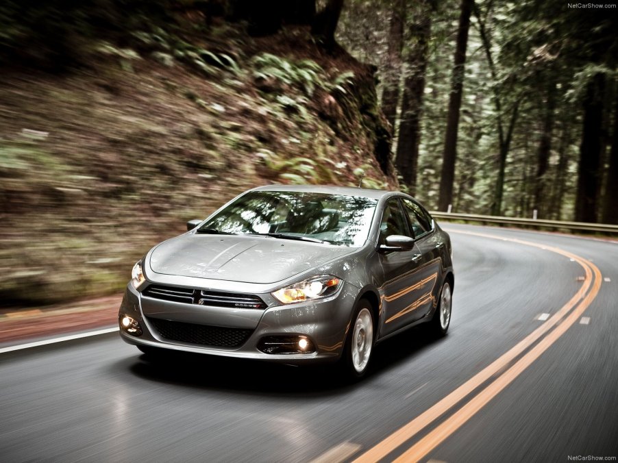 An image of a Dodge Dart parked outside.