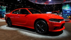 A Dodge Charger sits on display at an auto show