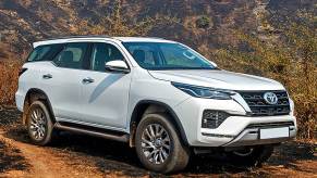 The 2021 Toyota Fortuner driving on a dirt road